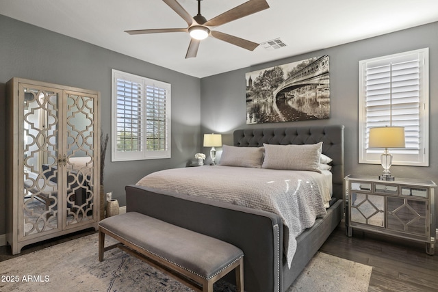 3770 E Ringtail Way, Phoenix, AZ 85050 - bedroom with wood finished floors and ceiling fan
