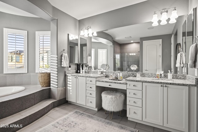 3770 E Ringtail Way, Phoenix, AZ 85050 - bathroom with a shower stall, tile patterned floors, and two vanities