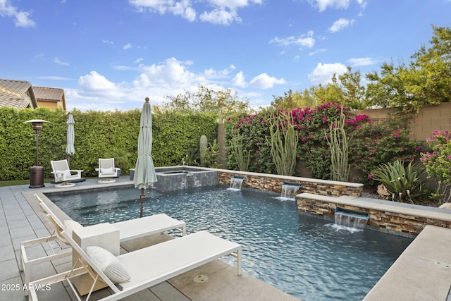 3770 E Ringtail Way, Phoenix, AZ 85050 - view of swimming pool featuring a fenced backyard, a pool with connected hot tub, and a patio
