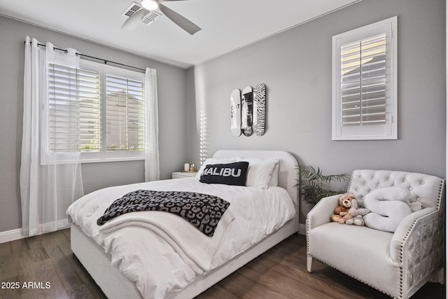 3770 E Ringtail Way, Phoenix, AZ 85050 - bedroom with dark wood-style floors and a ceiling fan