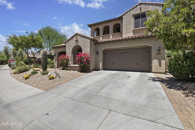 3770 E Ringtail Way, Phoenix, AZ 85050 - mediterranean / spanish home with stucco siding, a garage, and driveway