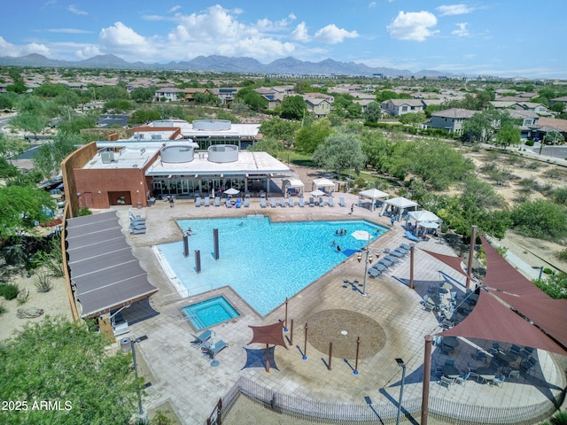 3770 E Ringtail Way, Phoenix, AZ 85050 - aerial view of residential area featuring a pool and a mountainous background