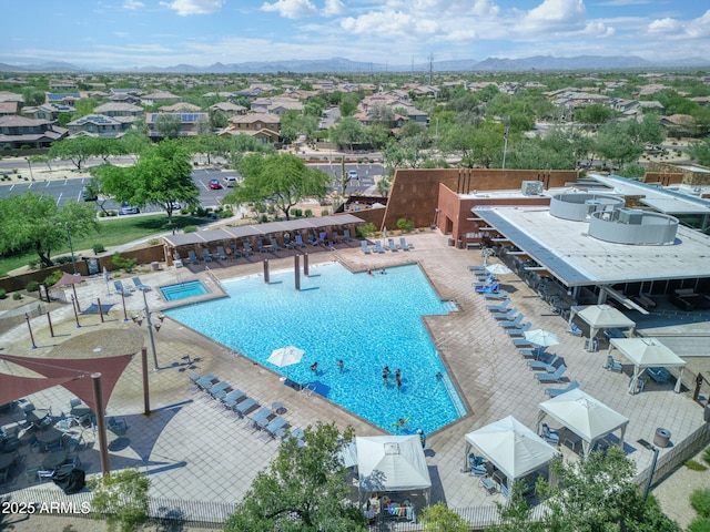 3770 E Ringtail Way, Phoenix, AZ 85050 - view of swimming pool with a mountain view and a residential view