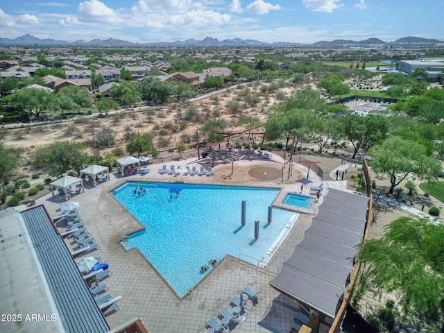 3770 E Ringtail Way, Phoenix, AZ 85050 - community pool featuring a mountain view and a patio area