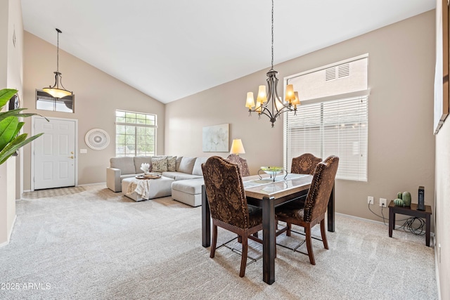 3488 N Lady Lake Ln, Casa Grande, AZ 85122 - carpeted dining room with a chandelier, baseboards, and high vaulted ceiling