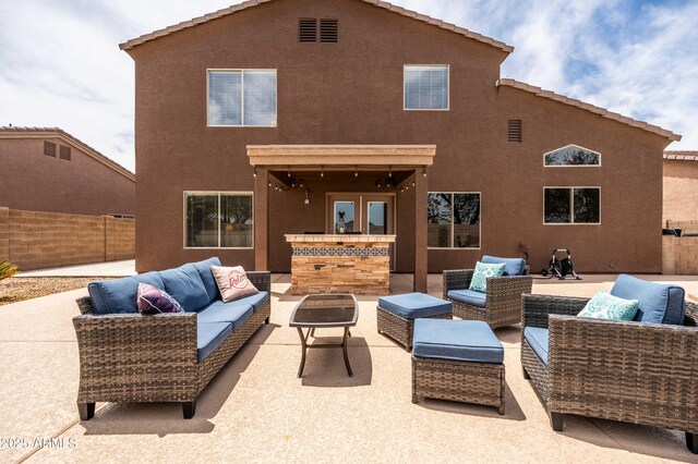 3488 N Lady Lake Ln, Casa Grande, AZ 85122 - view of patio with an outdoor living space and fence