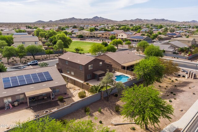 3488 N Lady Lake Ln, Casa Grande, AZ 85122 - aerial perspective of suburban area featuring a mountainous background and a pool area