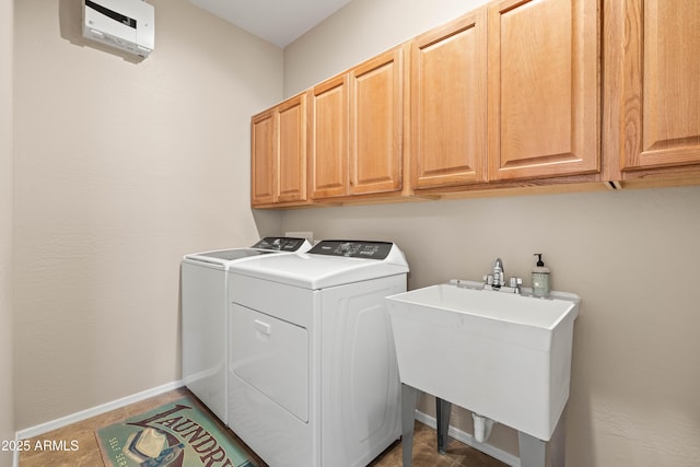 3488 N Lady Lake Ln, Casa Grande, AZ 85122 - laundry room featuring washing machine and dryer, cabinet space, baseboards, and tile patterned floors