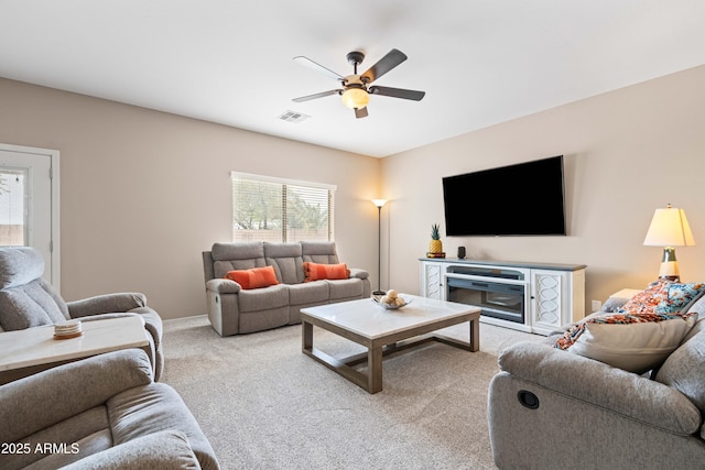 3488 N Lady Lake Ln, Casa Grande, AZ 85122 - carpeted living area with a ceiling fan