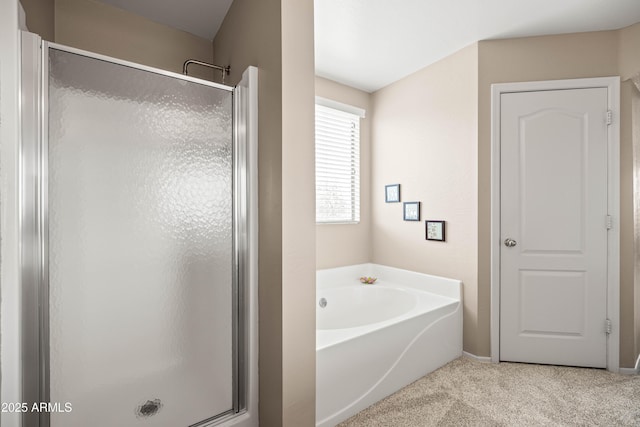 3488 N Lady Lake Ln, Casa Grande, AZ 85122 - bathroom featuring a stall shower, a bath, and baseboards