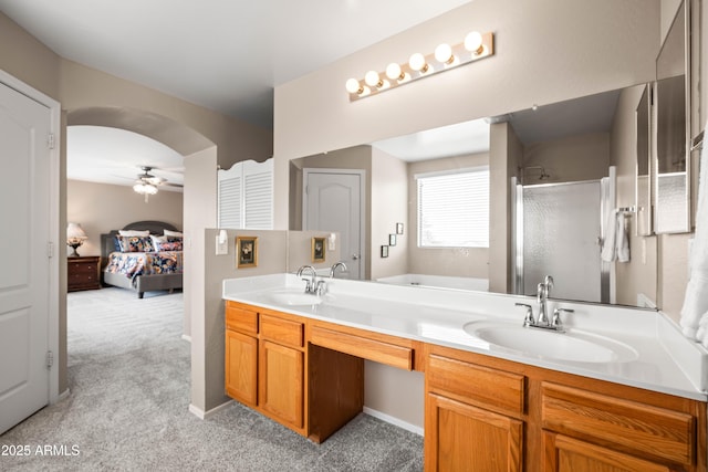 3488 N Lady Lake Ln, Casa Grande, AZ 85122 - ensuite bathroom with a ceiling fan, a shower stall, double vanity, and a tub