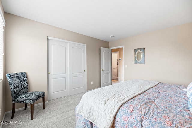 3488 N Lady Lake Ln, Casa Grande, AZ 85122 - bedroom with light carpet, a closet, and baseboards