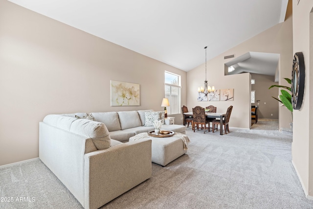 3488 N Lady Lake Ln, Casa Grande, AZ 85122 - living area with light carpet, a chandelier, high vaulted ceiling, and baseboards