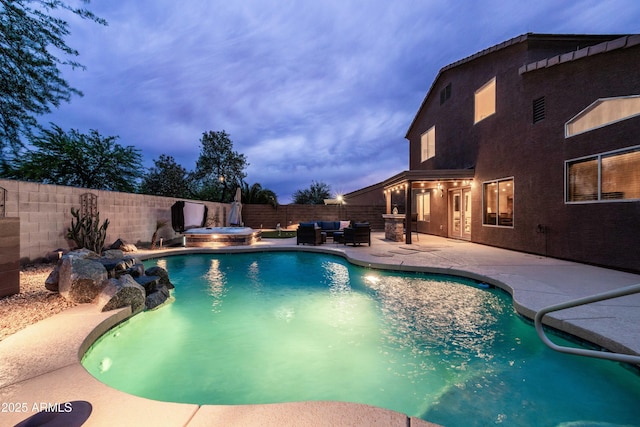 3488 N Lady Lake Ln, Casa Grande, AZ 85122 - view of pool featuring a fenced backyard, an outdoor living space, a patio, and an in-ground hot tub