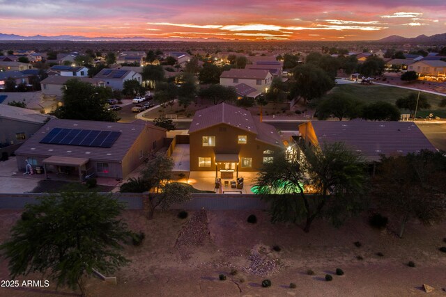 3488 N Lady Lake Ln, Casa Grande, AZ 85122 - aerial view of property and surrounding area with a mountain backdrop and nearby suburban area
