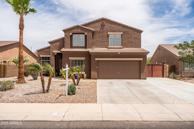 3488 N Lady Lake Ln, Casa Grande, AZ 85122 - traditional home featuring concrete driveway, a garage, stucco siding, fence, and a gate