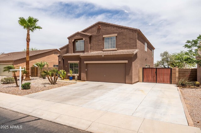 3488 N Lady Lake Ln, Casa Grande, AZ 85122 - traditional home with a gate, a garage, fence, and stucco siding