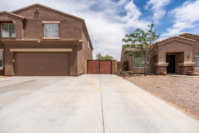 3488 N Lady Lake Ln, Casa Grande, AZ 85122 - view of front of home featuring a gate, stucco siding, driveway, a garage, and a tile roof