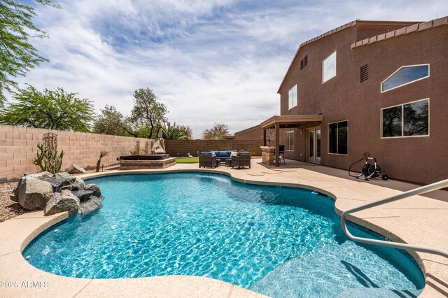3488 N Lady Lake Ln, Casa Grande, AZ 85122 - view of pool with outdoor lounge area, a fenced backyard, a patio area, and a jacuzzi