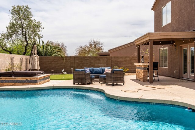 3488 N Lady Lake Ln, Casa Grande, AZ 85122 - view of pool with a fenced backyard, a patio, an outdoor living space, an outdoor hot tub, and french doors