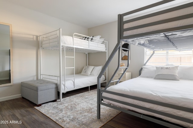 bedroom featuring dark wood-type flooring