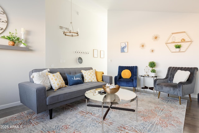 living room with dark wood-type flooring and vaulted ceiling