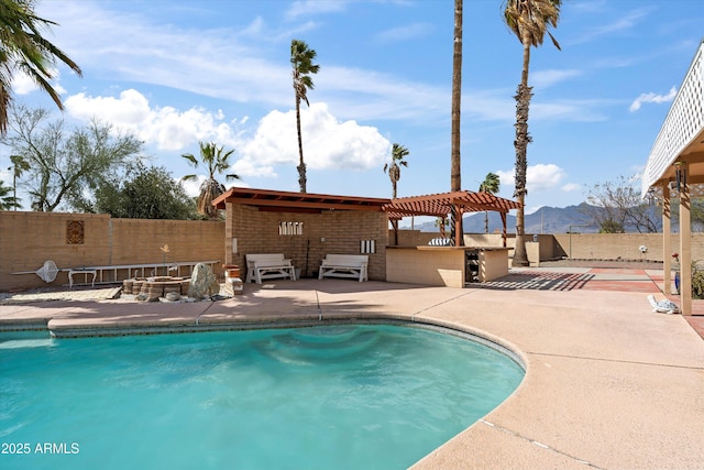 view of pool with a patio, a fenced in pool, area for grilling, a fenced backyard, and a pergola