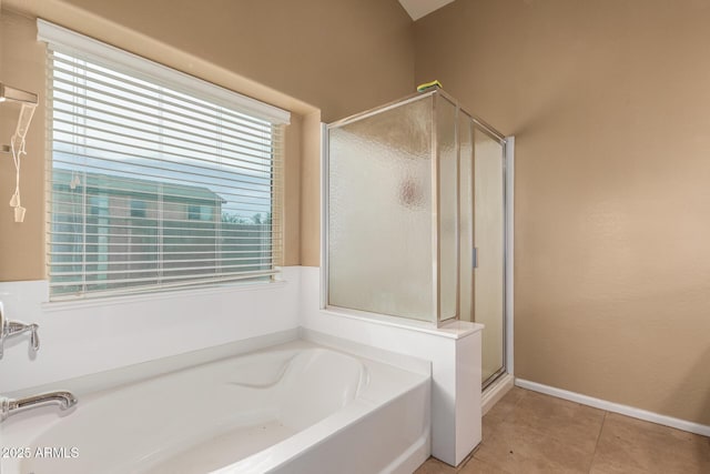 23613 W Mobile Ln, Buckeye, AZ 85326 - full bath featuring a shower stall, a bath, and tile patterned flooring