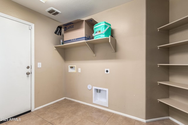 23613 W Mobile Ln, Buckeye, AZ 85326 - laundry area featuring hookup for an electric dryer, hookup for a washing machine, tile patterned floors, baseboards, and gas dryer hookup
