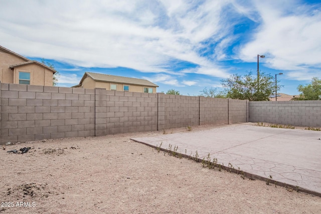 23613 W Mobile Ln, Buckeye, AZ 85326 - fenced backyard with a patio