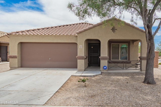 23613 W Mobile Ln, Buckeye, AZ 85326 - mediterranean / spanish home featuring stucco siding, an attached garage, driveway, and a tile roof