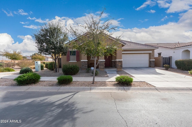 view of front of property featuring a garage