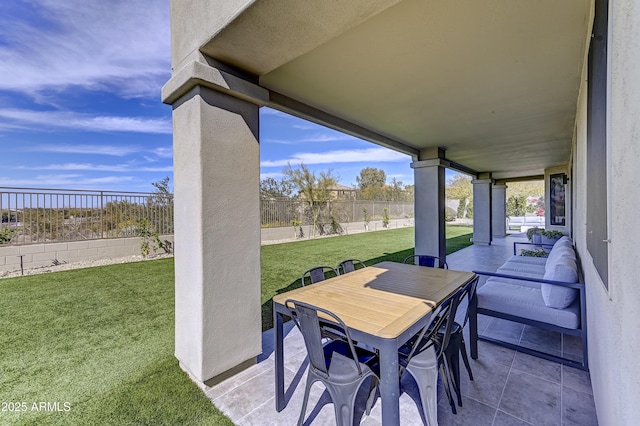 view of patio / terrace featuring outdoor dining area and a fenced backyard