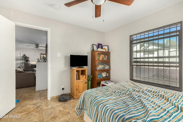 bedroom featuring ceiling fan