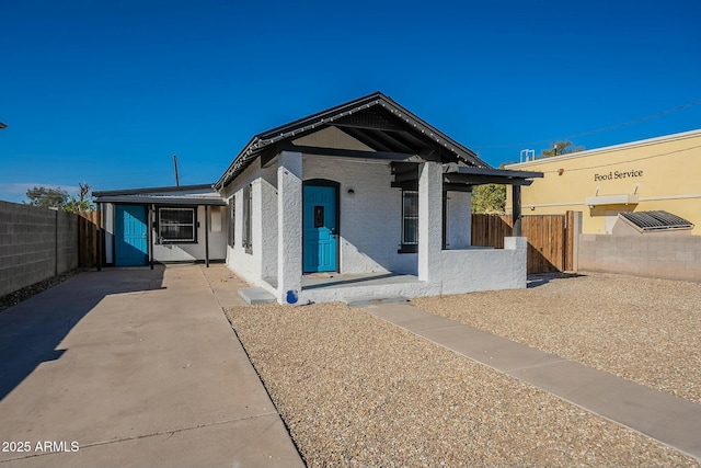 bungalow featuring covered porch