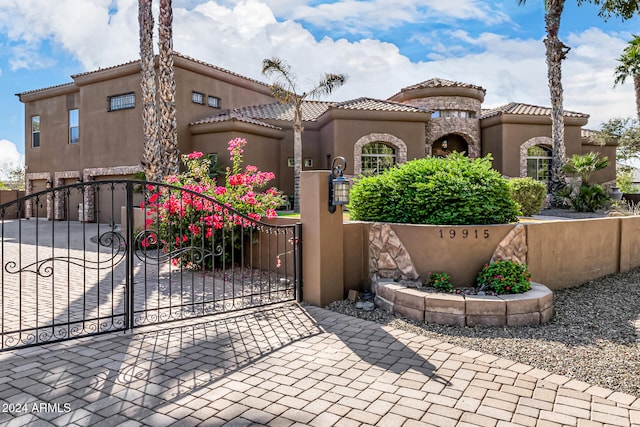 view of gate featuring a garage