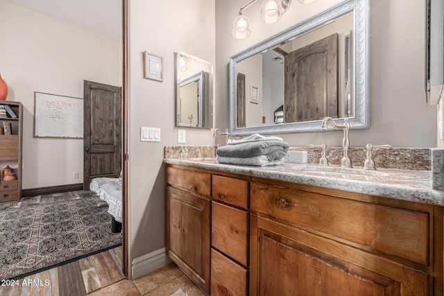 bathroom featuring vanity and hardwood / wood-style flooring