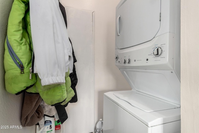 laundry area with laundry area and stacked washing maching and dryer