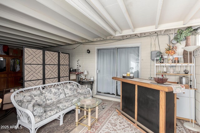 living room with beam ceiling