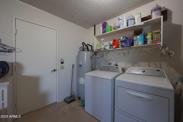 laundry area featuring separate washer and dryer, electric water heater, and a textured ceiling