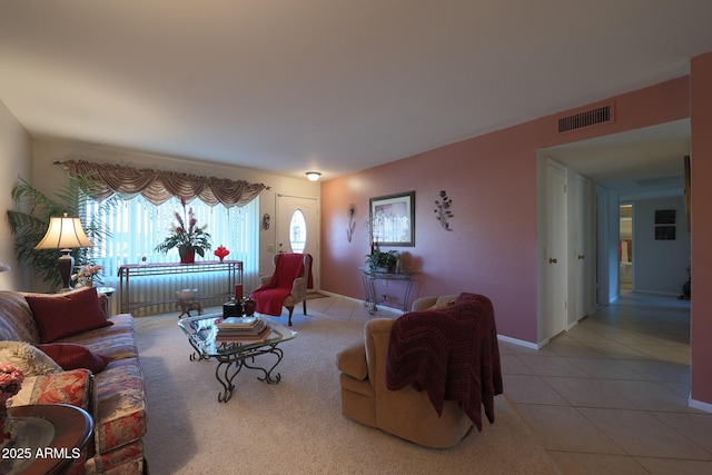 living room with light tile patterned flooring