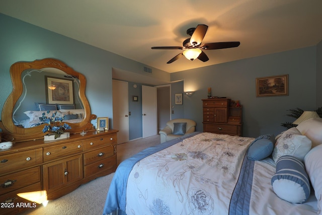 carpeted bedroom featuring ceiling fan