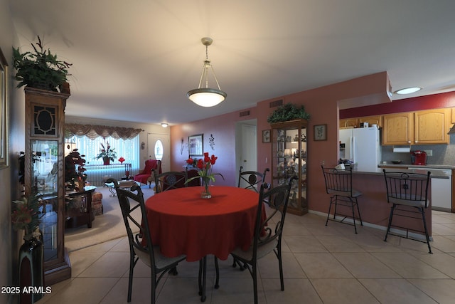 view of tiled dining area