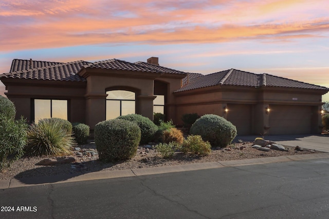 view of front of house with a garage