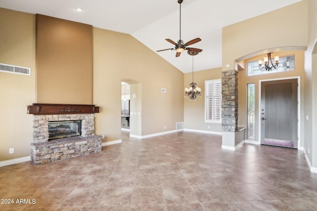 unfurnished living room featuring a stone fireplace, light tile patterned flooring, high vaulted ceiling, and ceiling fan