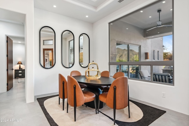 dining space featuring ceiling fan