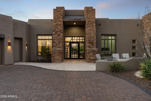 view of front of home with a patio area