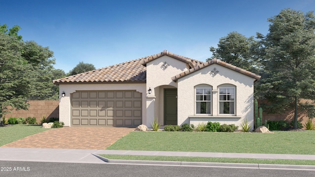 mediterranean / spanish house featuring a garage and a front yard