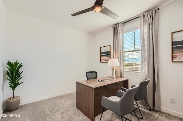 carpeted office with ceiling fan