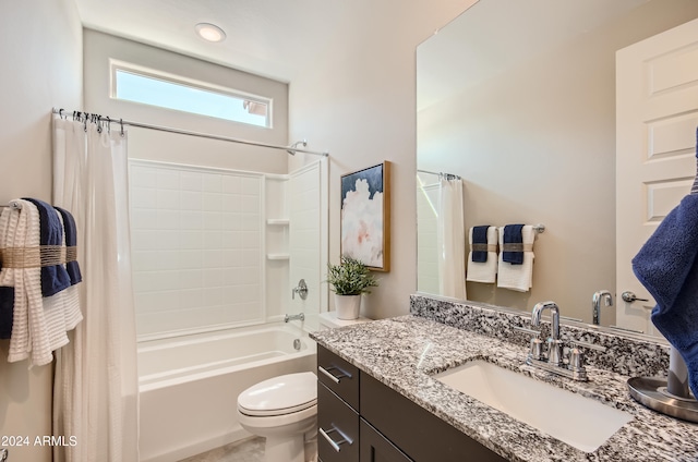 full bathroom featuring shower / bathtub combination with curtain, vanity, and toilet